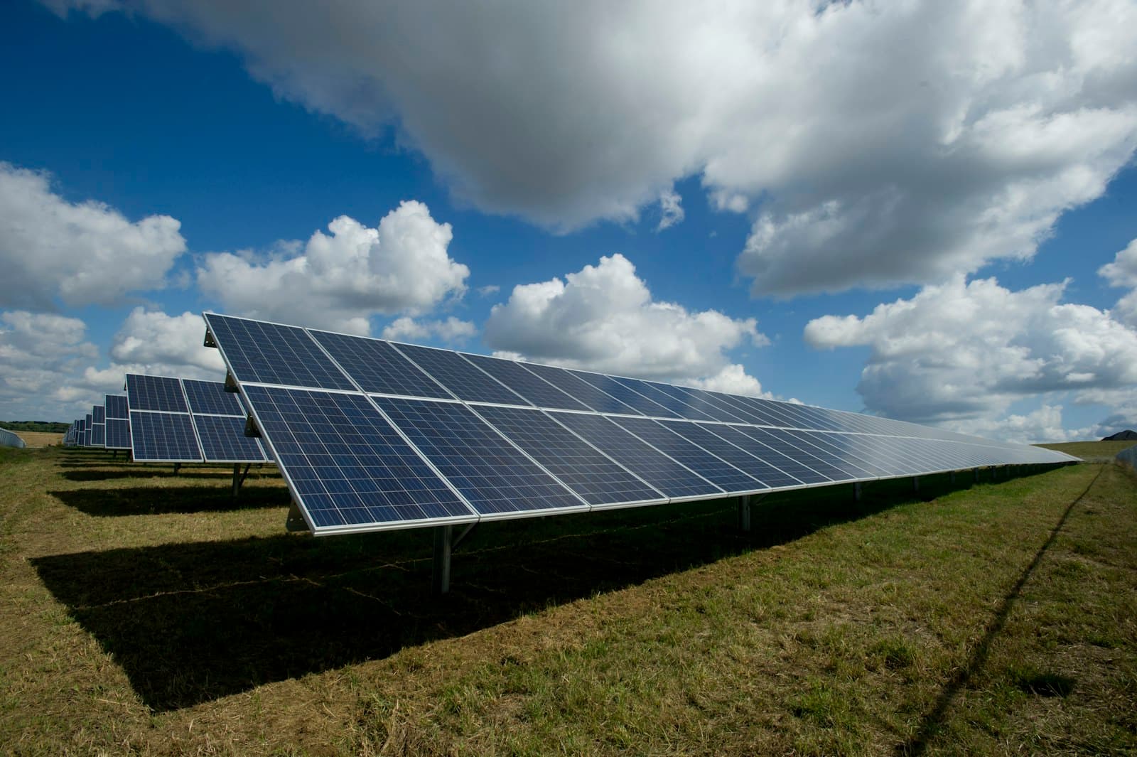 Illustrative solar array — placeholder for verified project photography